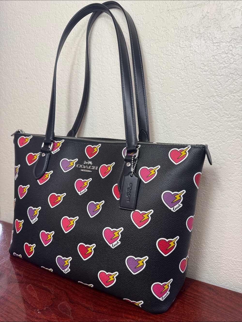Coach Heart Print Gallery Black Tote with Pink & Purple Heart Lightning Print